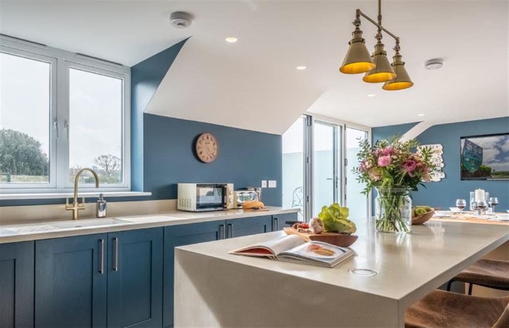 Enjoy the beautiful views from the kitchen  at May Cottage, Titchwell