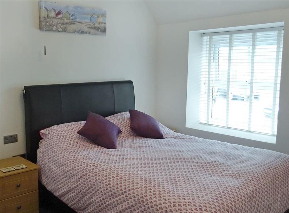 Relaxing double bedroom with kingsize bed at Maybird Cottage in Hayle, Cornwall