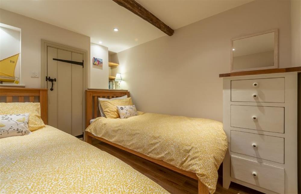 First floor: Bedroom three has full-size single twin beds (photo 4) at Mayes Cottage, Brancaster near Kings Lynn