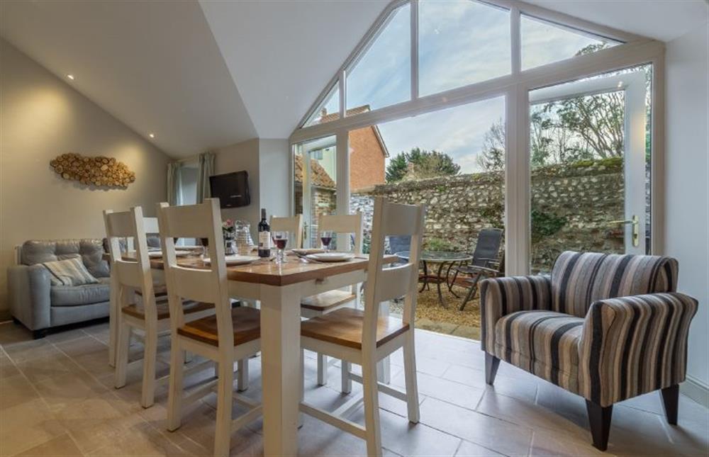 Ground floor:  Dining area  (photo 2) at Mayes Cottage, Brancaster near Kings Lynn