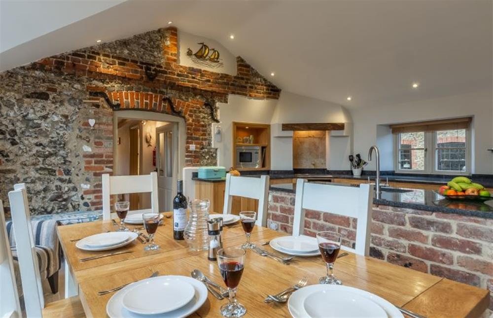 Ground floor:  Dining area with plenty of seating for six (photo 2) at Mayes Cottage, Brancaster near Kings Lynn
