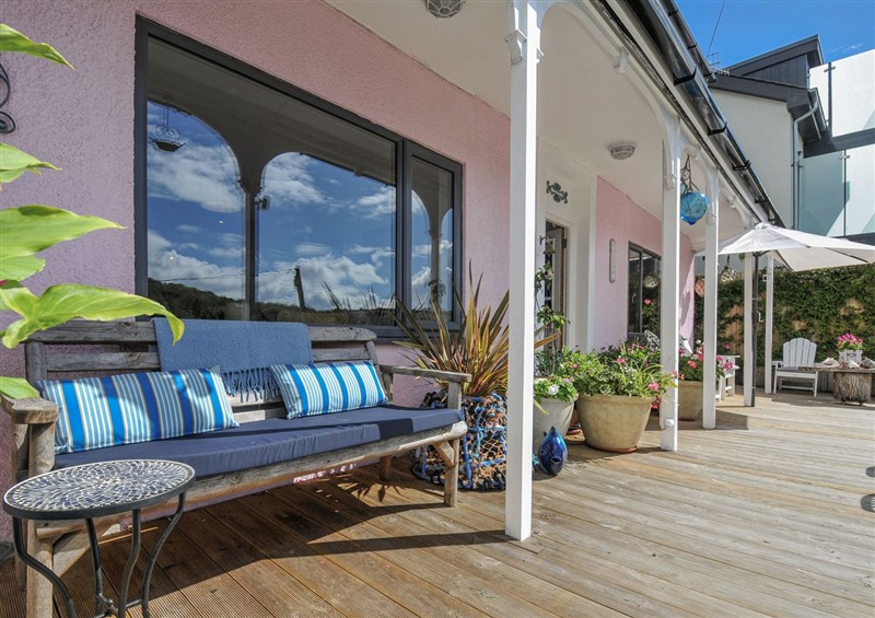 Enjoy a glass of wine on the patio at Mayhurst, Looe