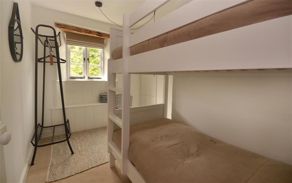 The bunk bedroom with sturdy 3 ft beds. at Mays Cottage in Beesands