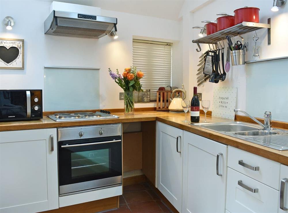Modern kitchen area at Meadow Barn in East Burton, near Wool, Dorset