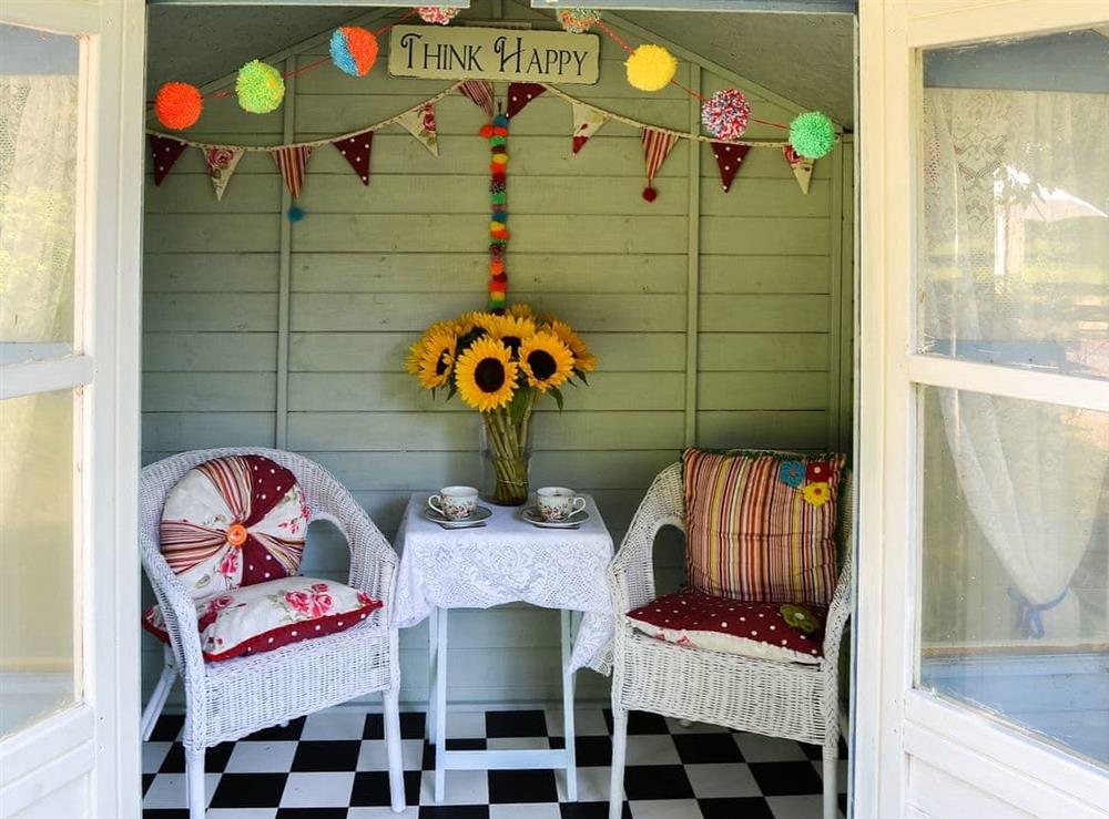 Bright and cheerful summerhouse at Meadow Cottage in Irstead, near Wroxham, Norfolk