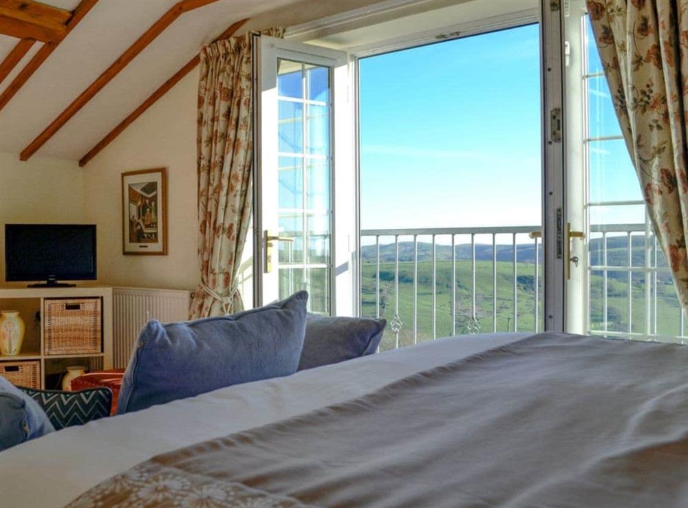 Light and airy bedroom with Juliet balcony at Meadow Croft in Llangeinor, Mid Glamorgan., Great Britain