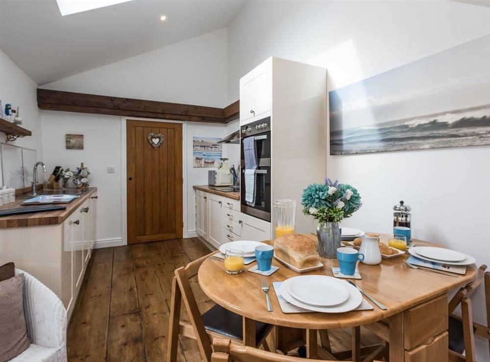 Kitchen and dining area at The Boat Shed, 