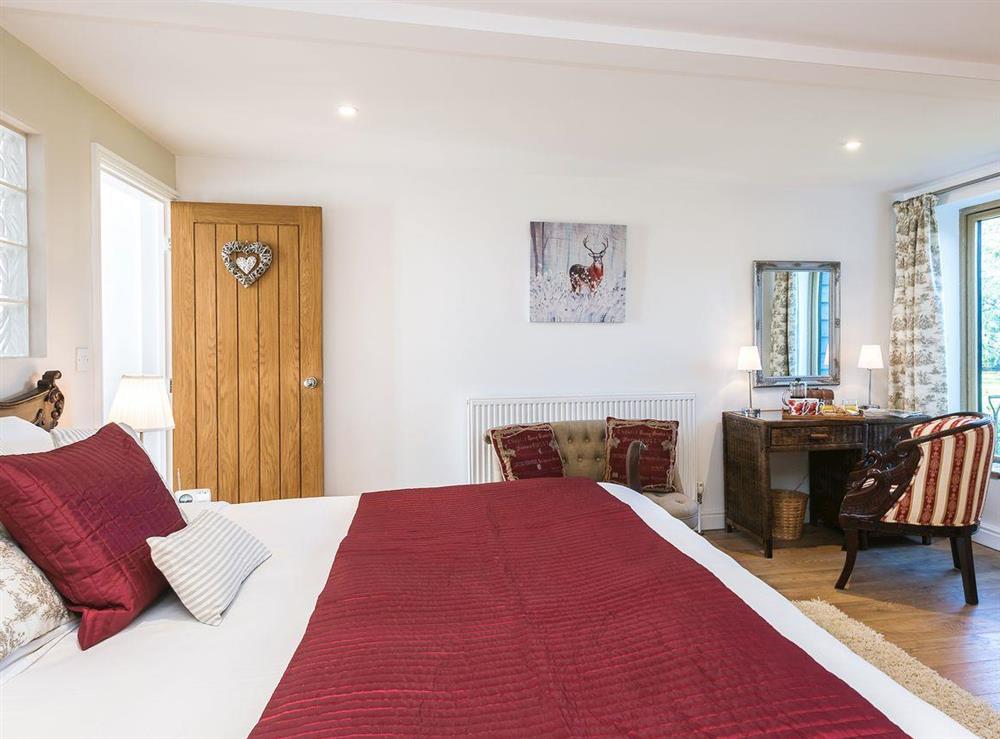 Comfortable and spacius bedroom with super kingsized bed at The Cart Lodge, 