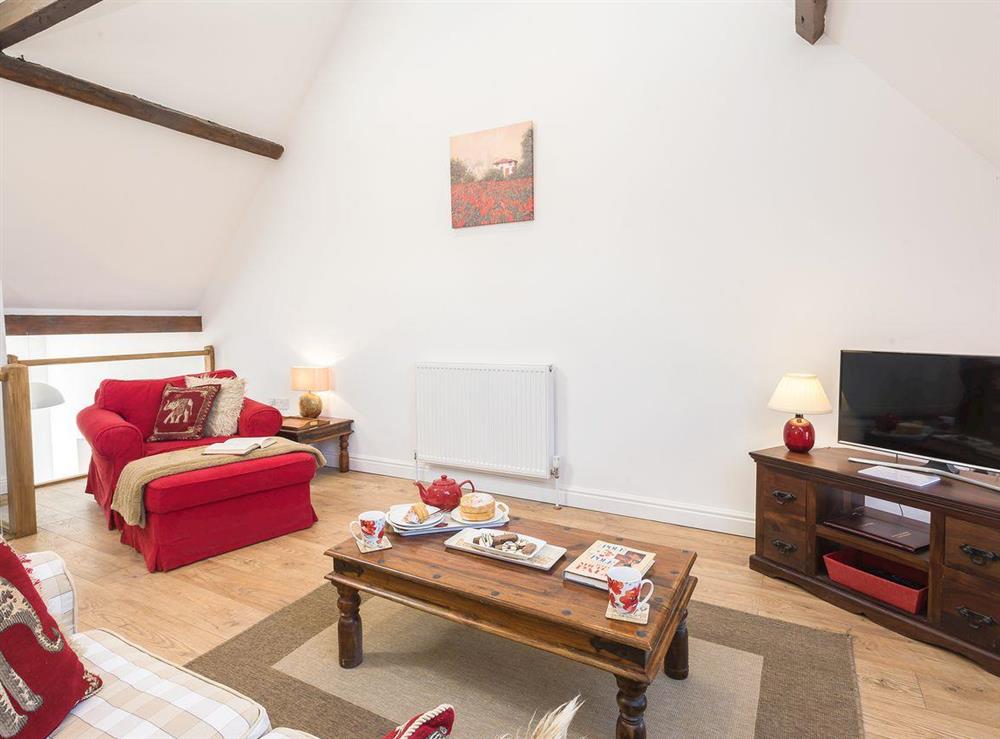Comfortable open plan living space at The Cart Lodge, 