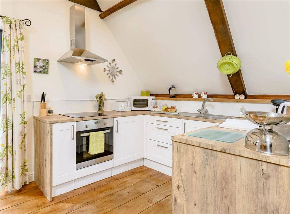 Spacious, well equipped kitchen area at The Hayloft, 