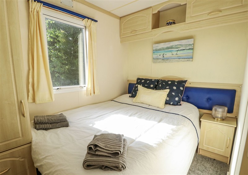 Bedroom at Meadow Island Caravan, Penygroes