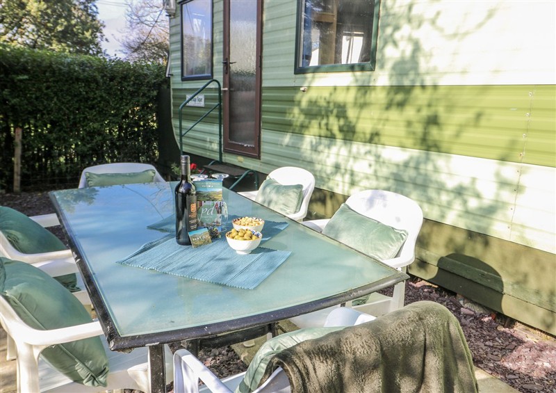 Enjoy the garden at Meadow Island Caravan, Penygroes