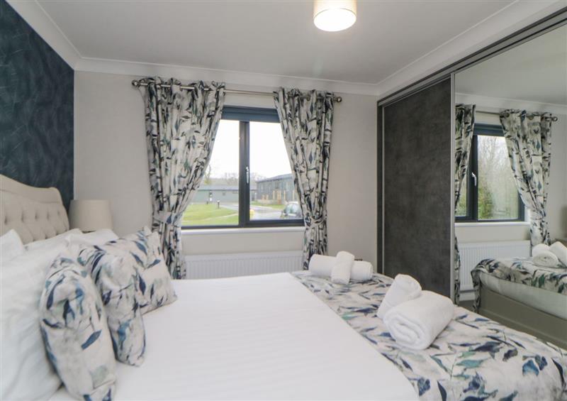 A bedroom in Meadow Lodge at Meadow Lodge, Broadwoodwidger near Lifton