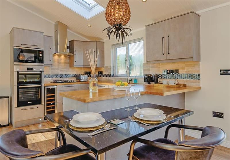 Kitchen and dininf area in The Woodbridge at Meadow Lodges Woodbridge in Bredfield, Woodbridge