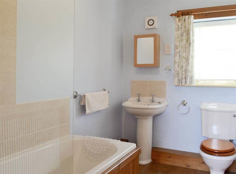 Family bathroom with shower over bath at Meadow View in Brandesburton, Nr Bridlington, East Yorkshire., North Humberside