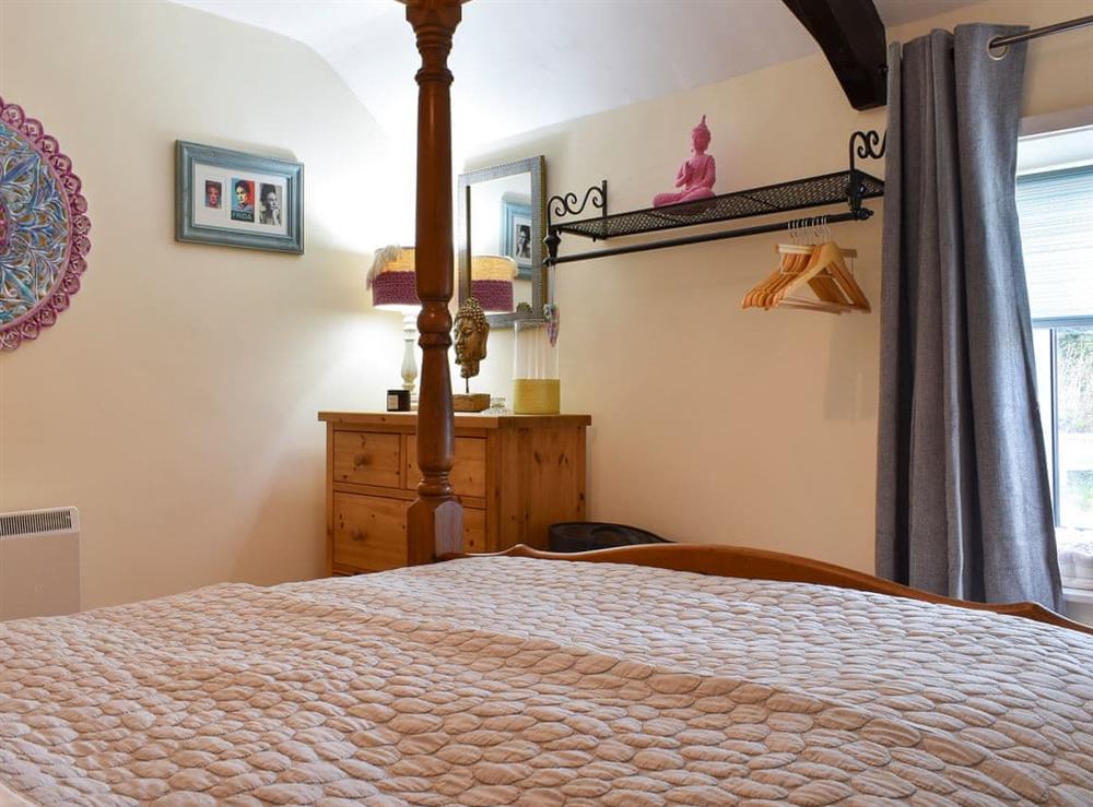 Four Poster bedroom (photo 2) at Meadow View Cottage in Pickering, North Yorkshire