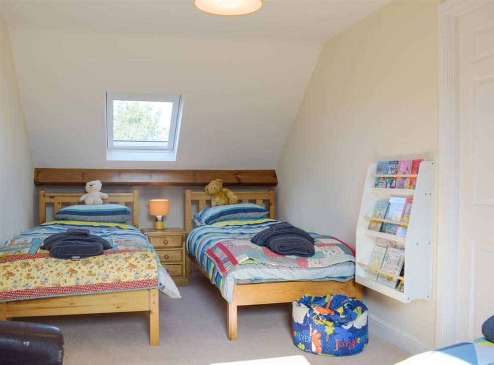 Bedroom with three single beds at Meadow View in Harley, near Shrewsbury, Shropshire