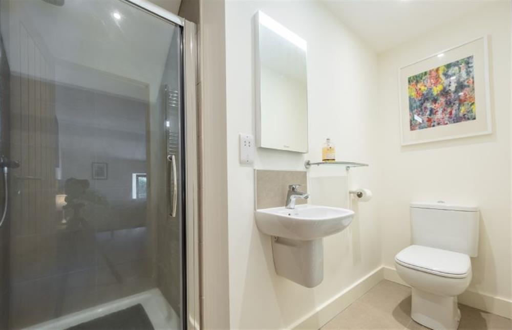 First floor: En-suite shower room with shower cubicle, wash basin and WC at Meadow View, Little Snoring near Fakenham