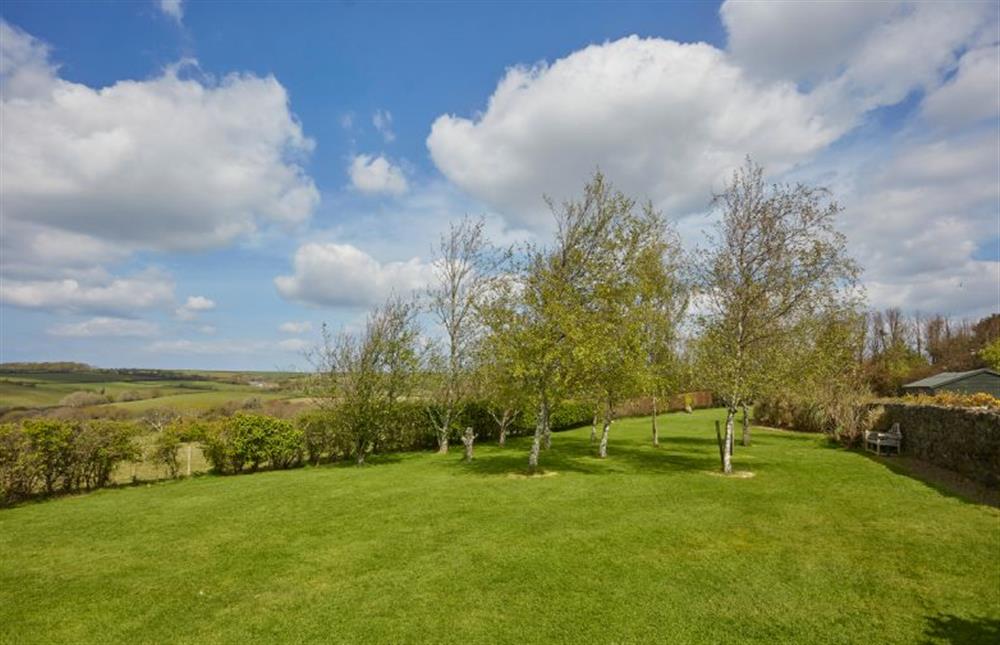 The large landscaped garden with panoramic views overlooking the Cornish countryside (photo 2) at Meadow View, Newquay