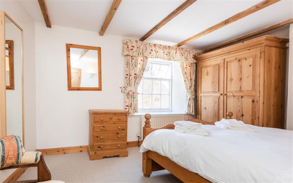 The master bedroom, light and comfortable at Meadow View in Slapton