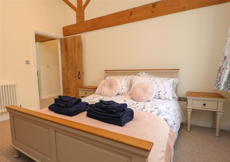 A bedroom in Meadowside Barn at Meadowside Barn, Wharles near Kirkham