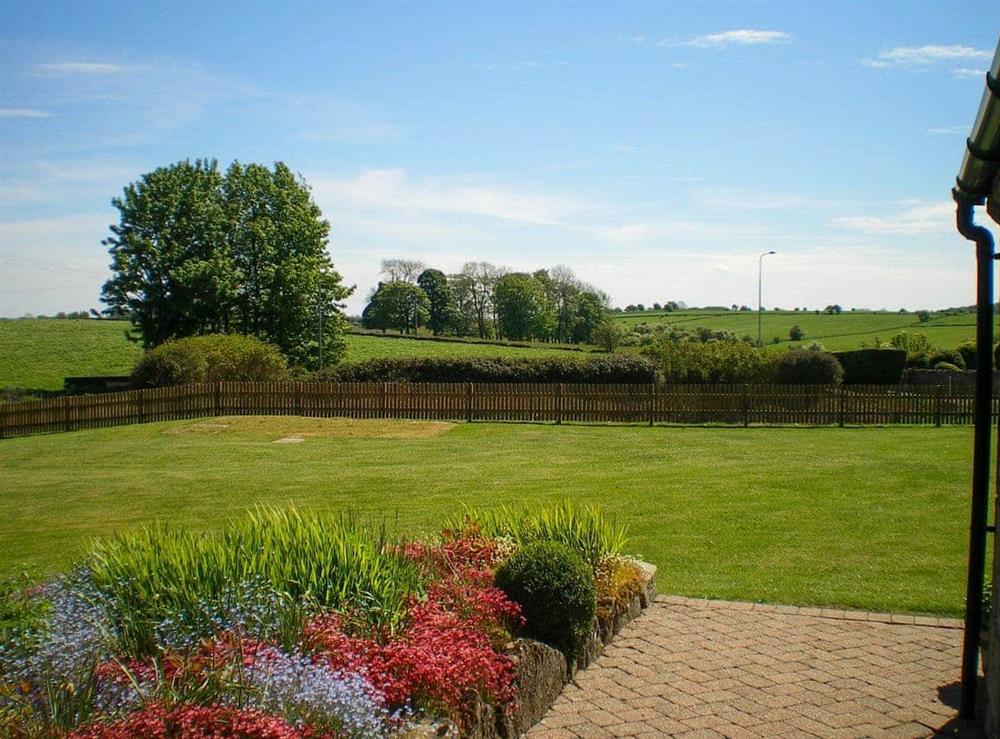 Spacious garden with patio and furniture (photo 2) at Meadowside Cottage in Calton Moor, Nr Ashbourne, Derbyshire., Great Britain