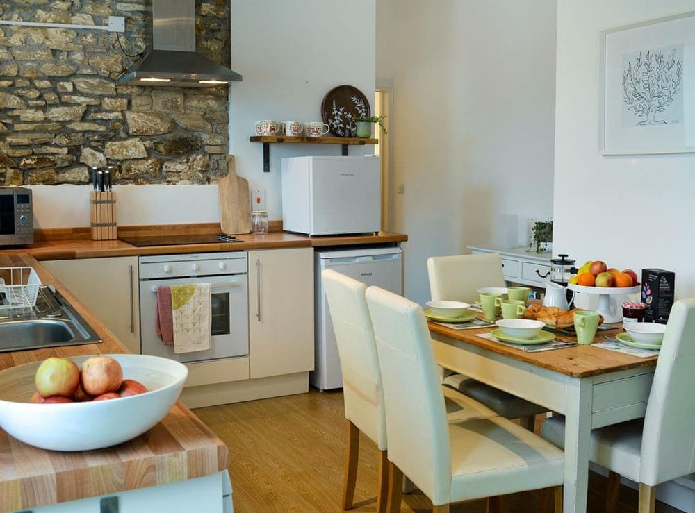 Inviting kitchen/dining room at Meadowside Forge in Ashwater, near Beaworthy, Devon