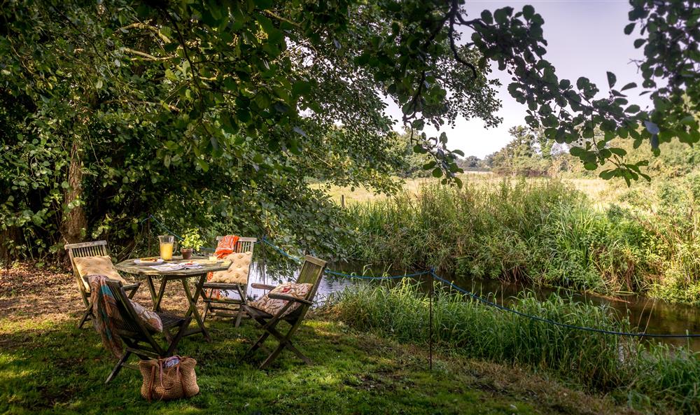 The riverside seating of Meadowside, nr Aylsham, Norfolk at Meadowside in Norwich, Norfolk