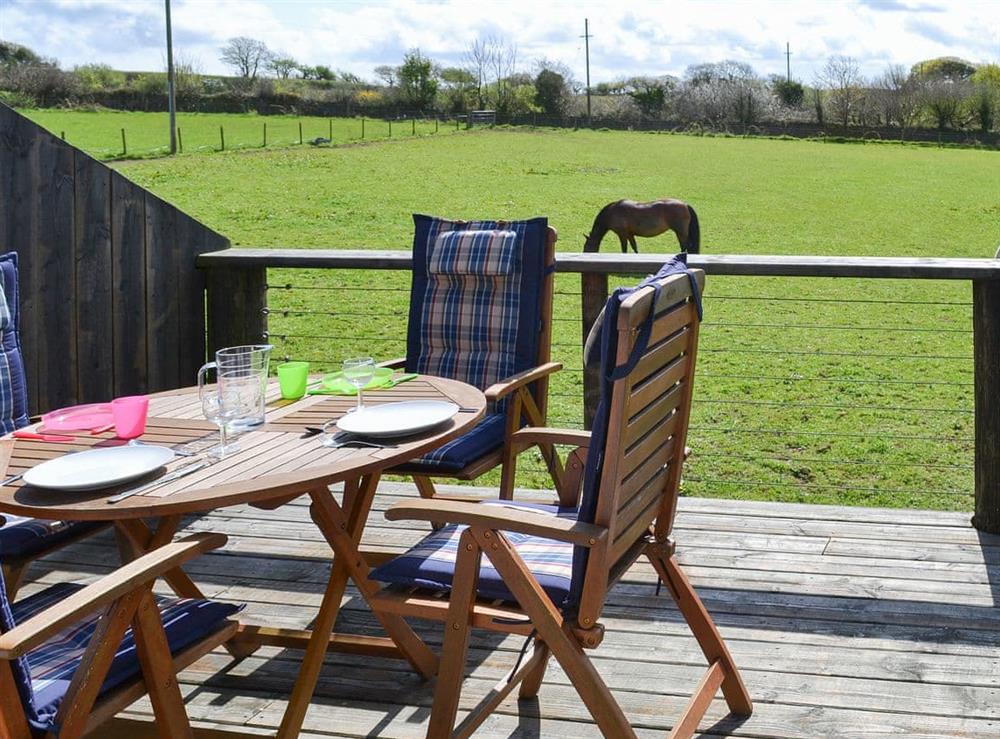 Outdoor space ideal for alfresco dining at Meadowside in St Austell, Cornwall