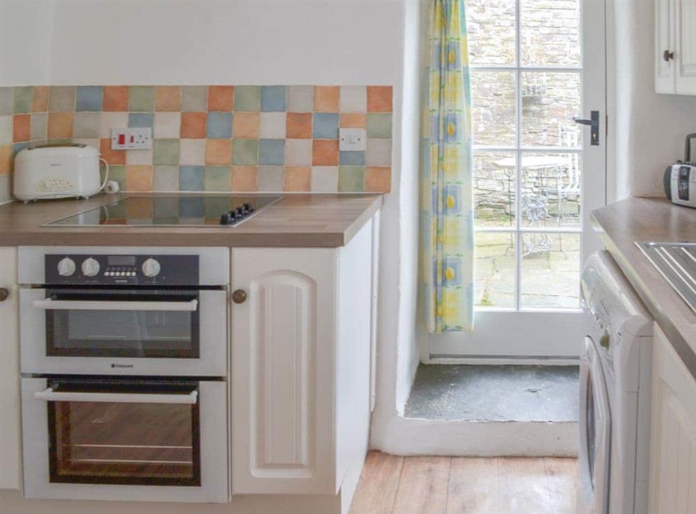 Kitchen with direct access to the patio at Meadwell in Trebarwith, Delabole., Cornwall