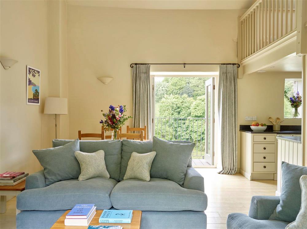 The sitting area, with deep comfortable sofas at Meavy Cottage, Dartmouth
