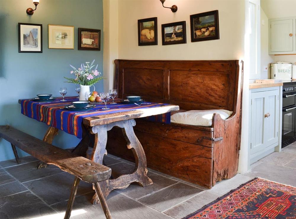 Farmhouse oak table and antique furniture at Megs Cottage in Butterton, near Leek, Staffordshire