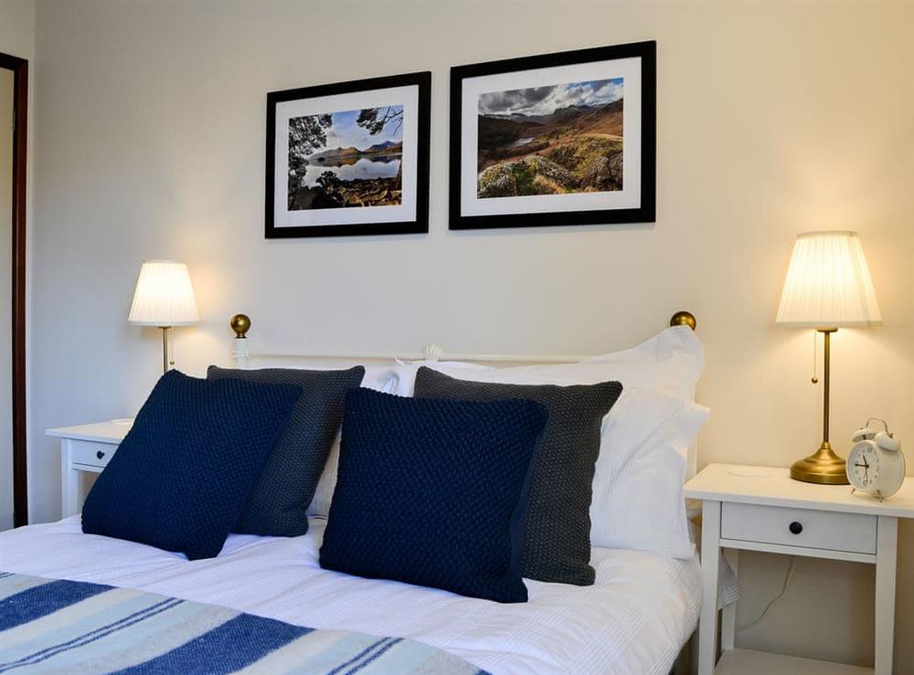 Comfortable double bedroom with ample storage space at Melbreak in High Lorton, near Cockermouth, Cumbria