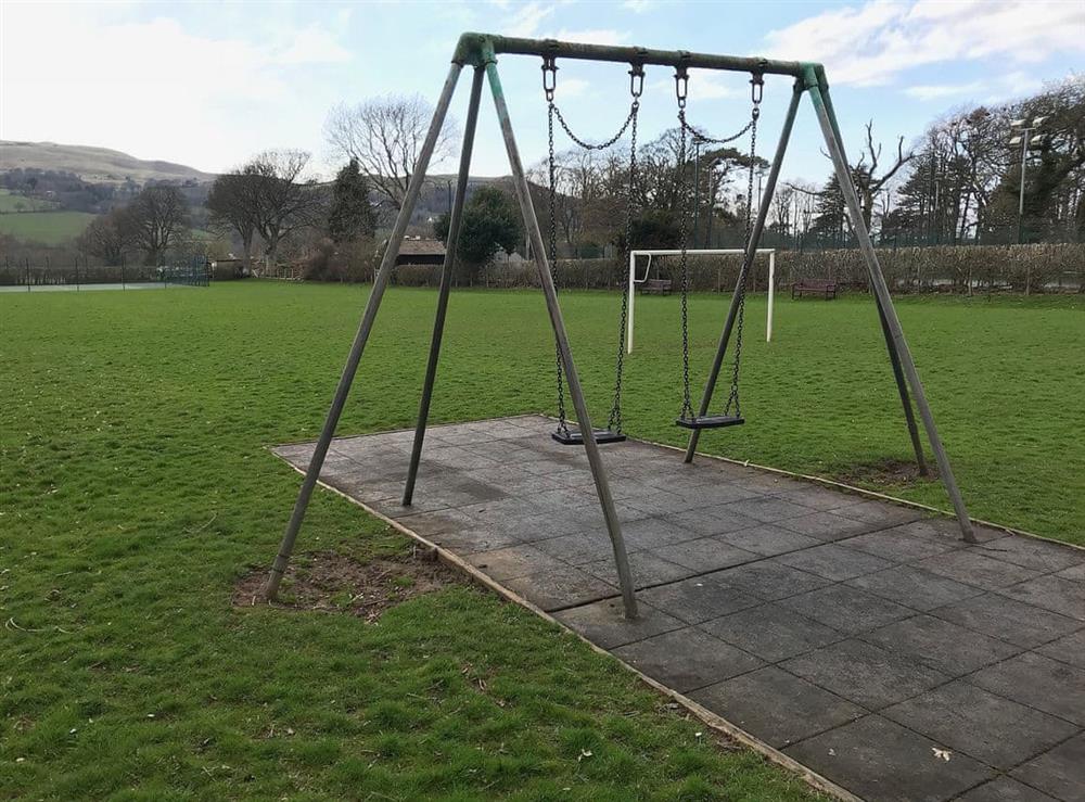 Village playing field and swings at Melbreak in High Lorton, near Cockermouth, Cumbria
