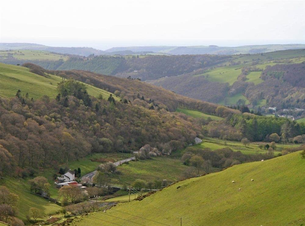 The road winds down into the valley below at Melindwr in Hen Goginan, near Aberystwyth, Dyfed