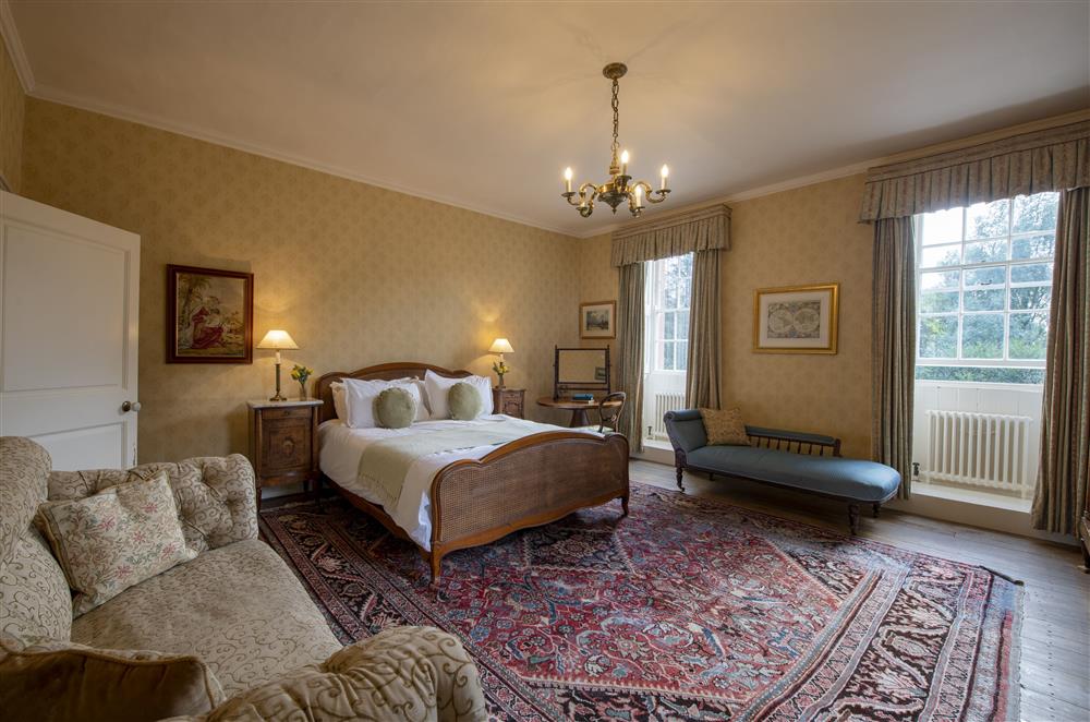 French Empire bedroom on the first floor with a 5’ double bed and en-suite bathroom at Melmerby Hall and Stag Cottage, Melmerby, near Langwathby, Penrith