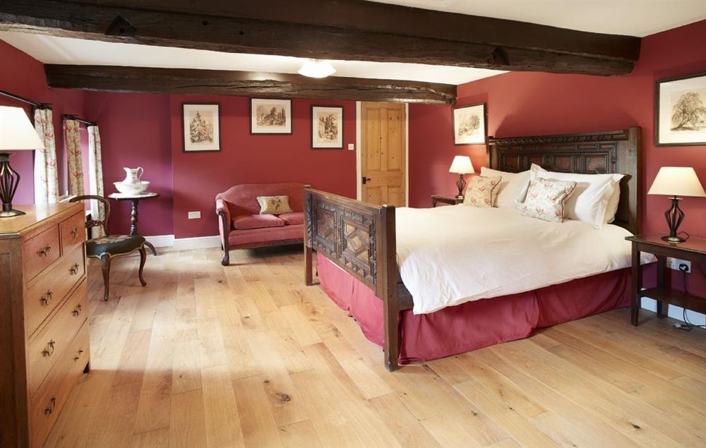 Master bedroom with 4’6 bed and en-suite bathroom at Melmerby Hall and Stag Cottage, Melmerby, near Langwathby, Penrith