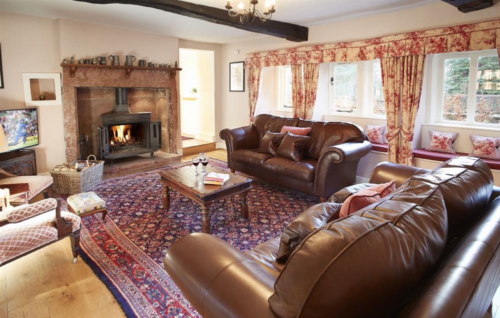Spacious sitting room with wood burning stove at Melmerby Hall and Stag Cottage, Melmerby, near Langwathby, Penrith