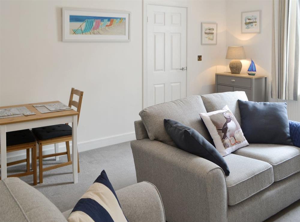 Stylish living and dining room at Melrose in Amble, Northumberland