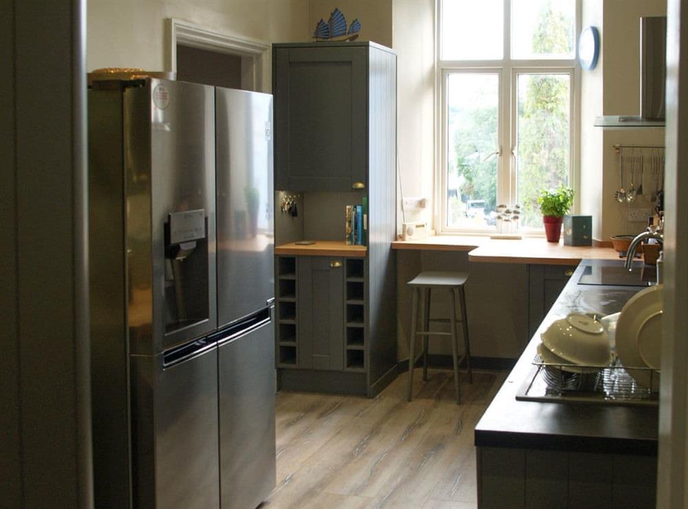 Well-equipped fitted kitchen at Neuadd, 
