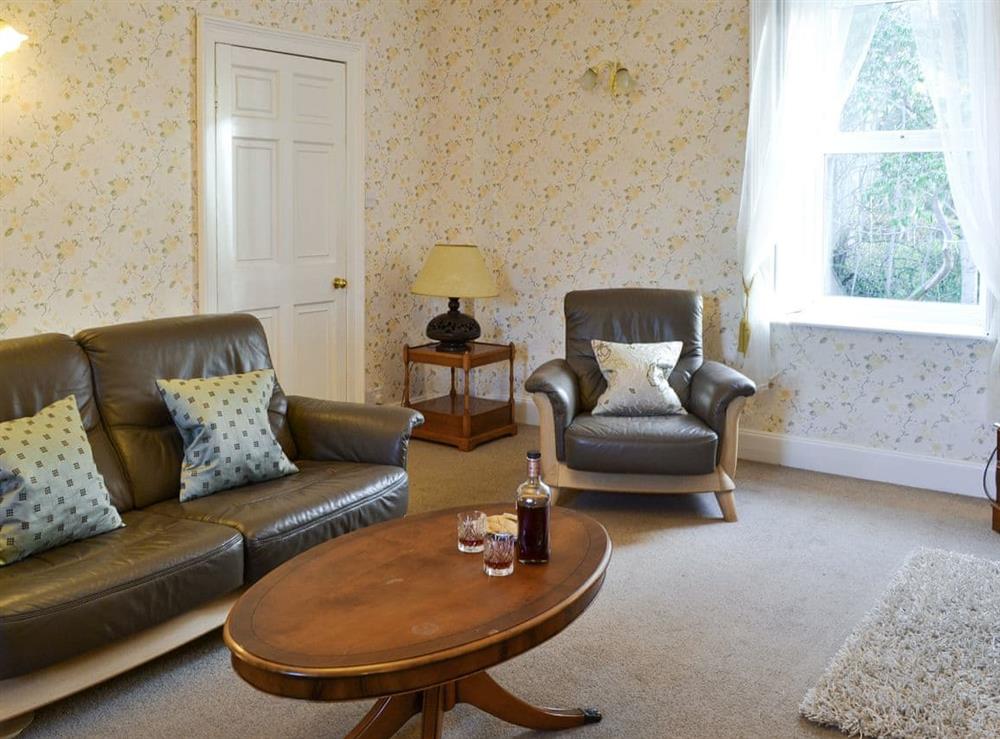 Spacious living room at Mercy Cottage in Beauly, Inverness-Shire