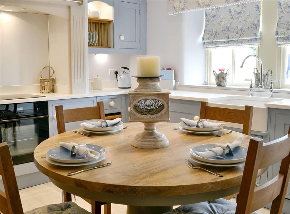 Quaint kitchen/ dining room at Adair Cottage, 
