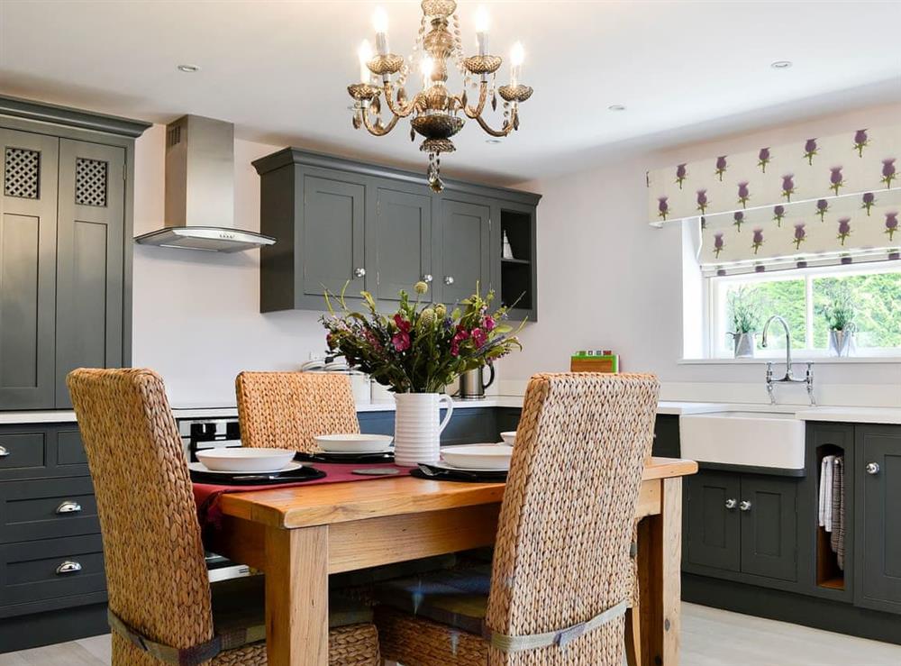 Bespoke hand built kitchen and dining area (photo 2) at Graydon Cottage, 