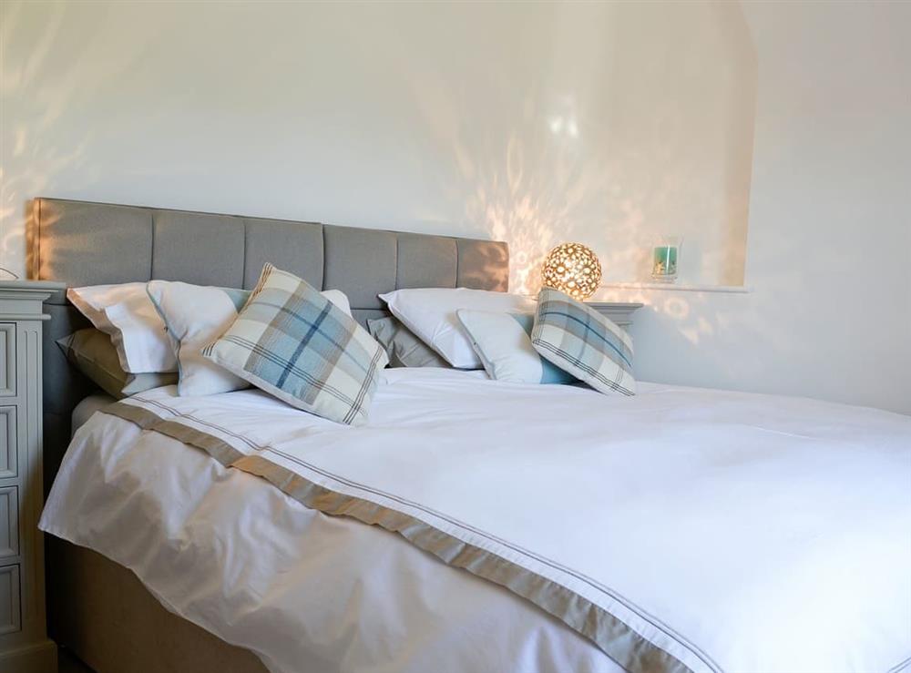 Twin bedroom configured as a double at Graydon Cottage, 