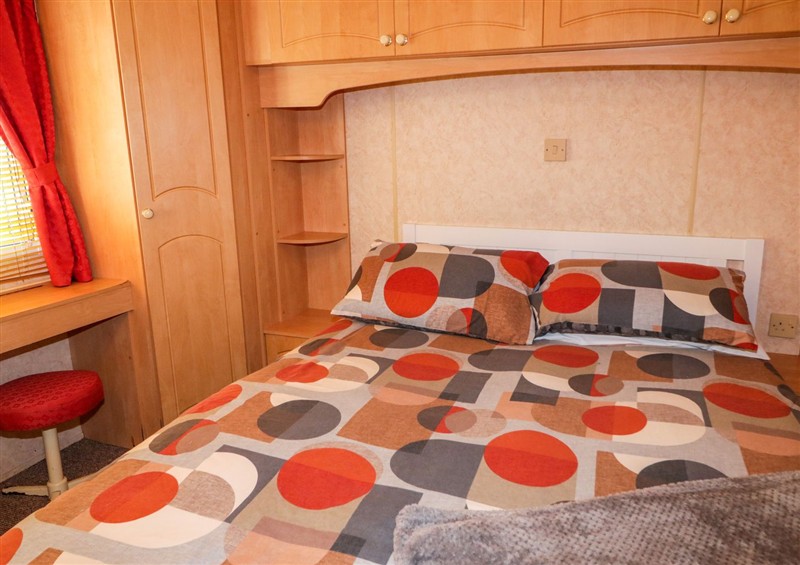 This is a bedroom at Meric Stone Holiday Lets Caravan 2, Benone near Castlerock