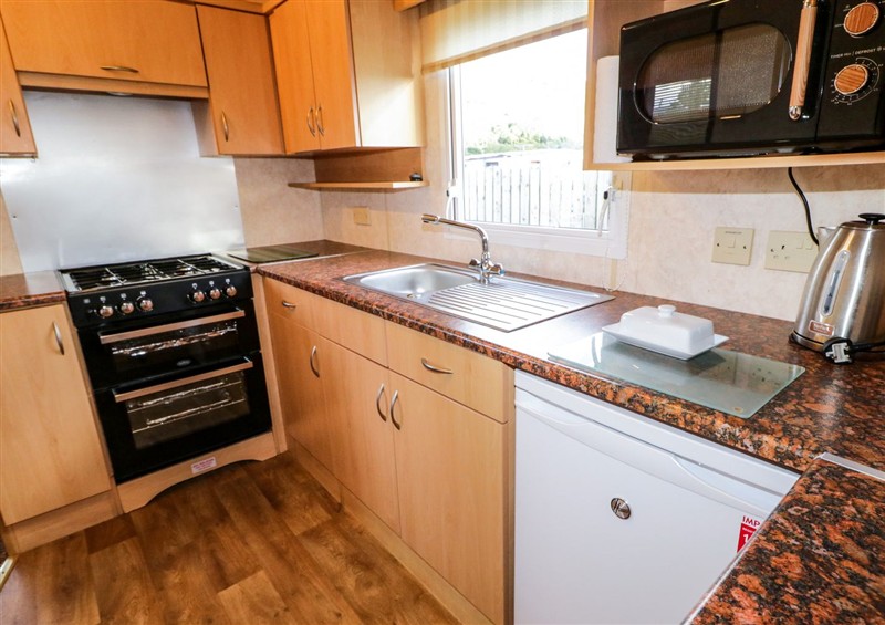 This is the kitchen at Meric Stone Holiday Lets Caravan 2, Benone near Castlerock