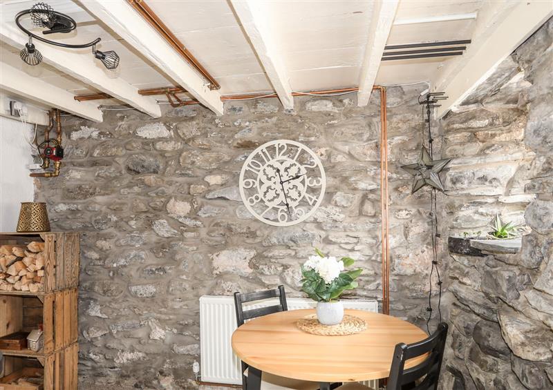 Relax in the living area at Merrion Cottage, Penmachno
