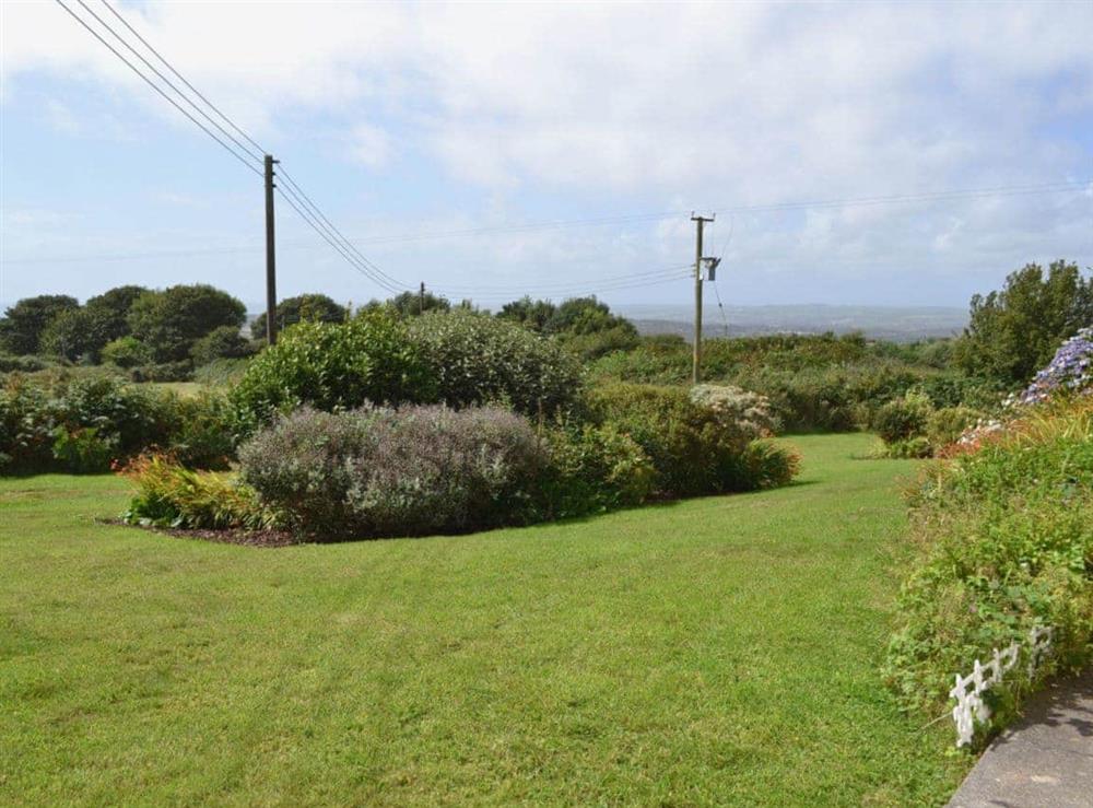Large enclosed lawned garden with patio and garden furniture (photo 2) at Merriview in Balwest, near Marazion, Cornwall