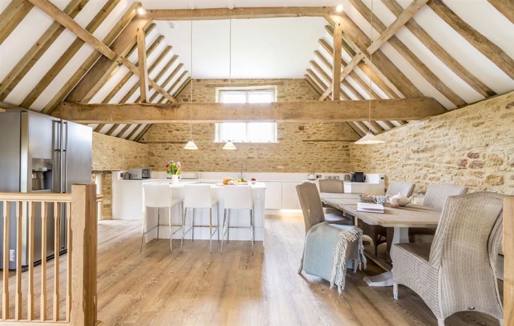 Open-plan sitting, dining and kitchen area at Merry Hill Barn, Portesham