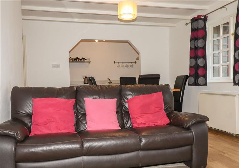 Relax in the living area at Merrymeets Cottage, St Tudy